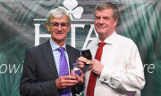  HTA President, Alan Down presents medal to Stan Green 